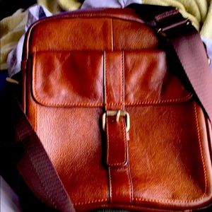 Genuine brown leather satchel.